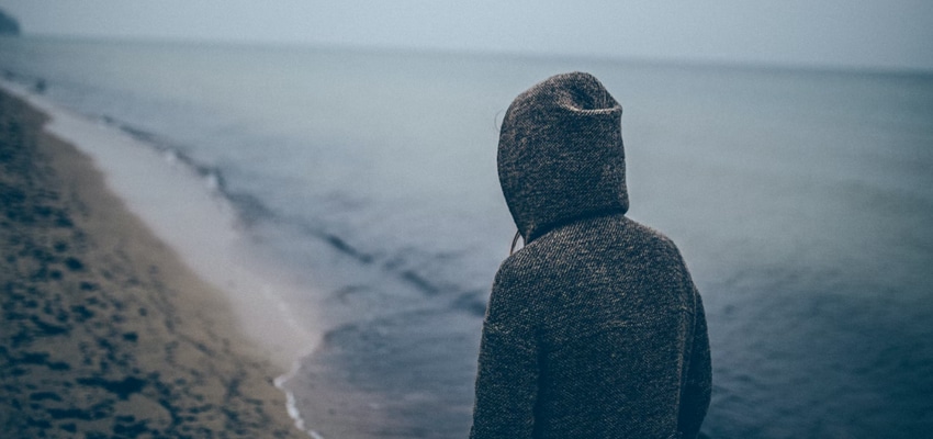 why depression happens - walking on beach alone